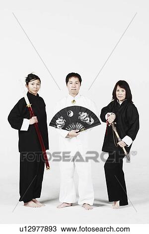 Portrait of two mature women and a mature man standing View Large Photo Image Stock Image - Portrait of two mature women and a mature man standing. Fotosearch