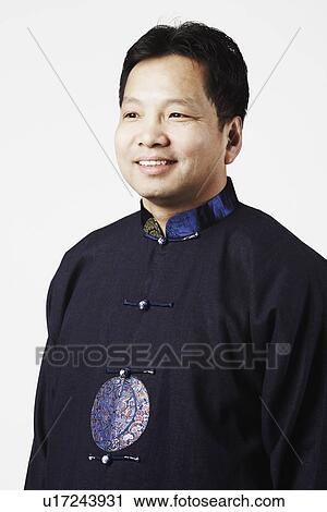 Close-up of a mid adult man smiling View Large Photo Image Stock Image - Close-up of a mid adult man smiling. Fotosearch