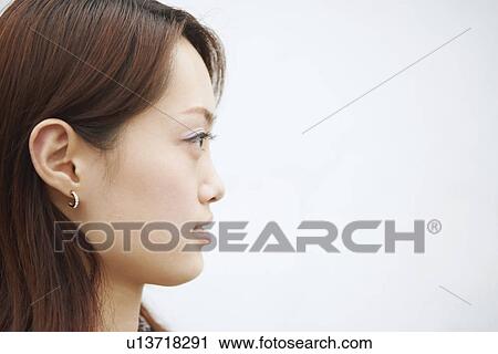 Stock Image - Close-up of a young woman. Fotosearch