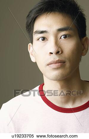 Portrait of a mid adult man thinking View Large Photo Image Stock Photography - Portrait of a mid adult man thinking. Fotosearch