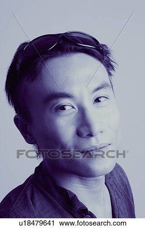 Stock Image - Portrait of a young man. Fotosearch