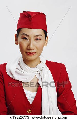 Portrait of an air stewardess View Large Photo Image Stock Image - Portrait of an air stewardess. Fotosearch