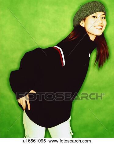 Portrait of a young woman smiling View Large Photo Image Stock Photography - Portrait of a young woman smiling. Fotosearch