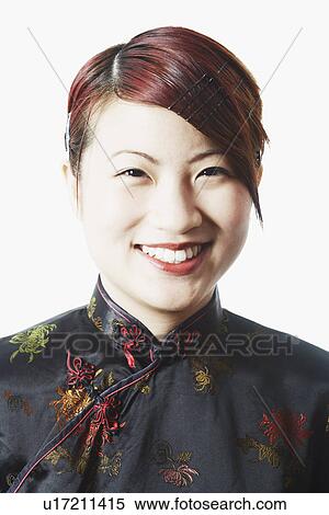 Stock Photography - Portrait of a young woman smiling. Fotosearch