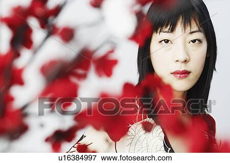Stock Photo - Portrait of a young woman. Fotosearch