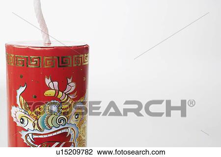 Stock Image - Close-up of a Chinese fire cracker. Fotosearch