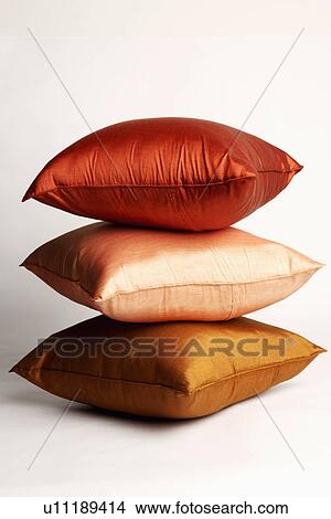 Close-up of a stack of cushions View Large Photo Image Picture - Close-up of a stack of cushions. Fotosearch