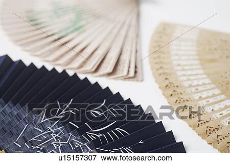 Close-up of three folding fans View Large Photo Image Stock Photo - Close-up of three folding fans. Fotosearch