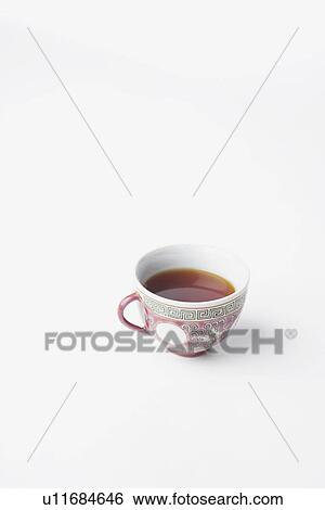 Stock Photograph - High angle view of a cup of black tea. Fotosearch