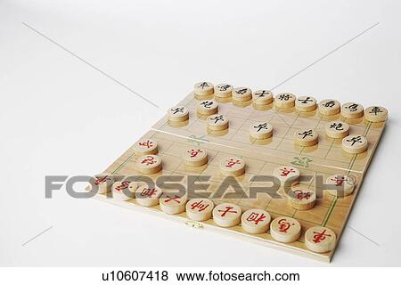 Stock Photo - High angle view of a game of Chinese chess. Fotosearch
