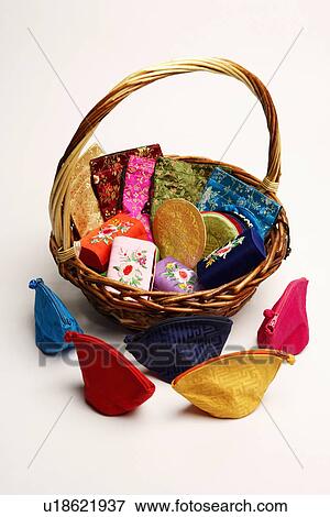 High angle view of a heap of purses in a wicker basket View Large Photo Image Stock Photo - High angle view of a heap of purses in a wicker basket. Fotosearch