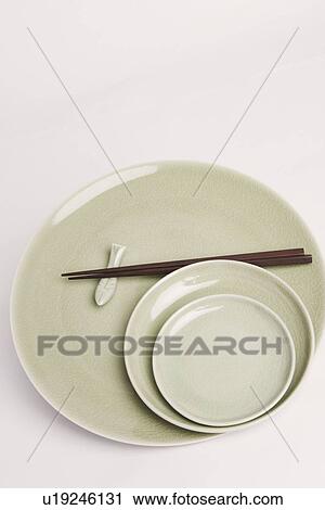 High angle view of chopsticks and plates View Large Photo Image Stock Image - High angle view of chopsticks and plates. Fotosearch