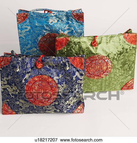 Stock Photo - High angle view of three hand bags. Fotosearch