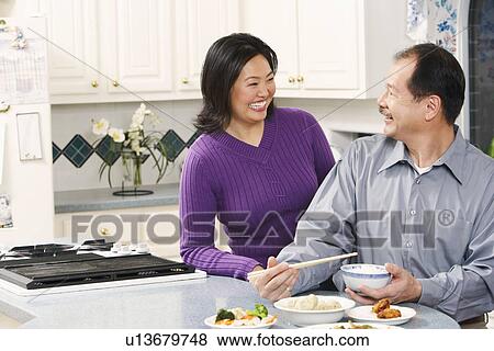 Close-up of a senior man looking at a mature woman View Large Photo Image Stock Photo - Close-up of a senior man looking at a mature woman. Fotosearch