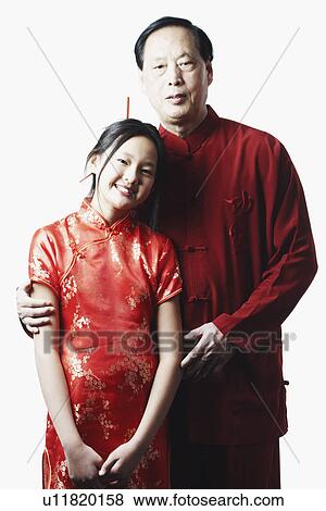 Stock Photo - Portrait of a grandfather with his granddaughter. Fotosearch