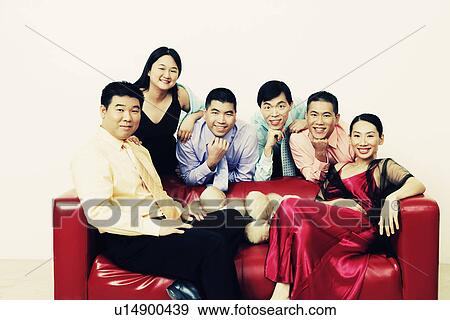 Stock Photo - Portrait of a group of business executives posing. Fotosearch