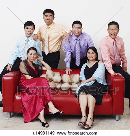 Stock Photo - Portrait of a group of business executives posing. Fotosearch