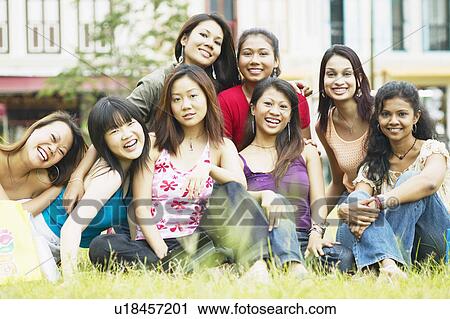 Portrait of a group of young women smiling View Large Photo Image Stock Image - Portrait of a group of young women smiling. Fotosearch