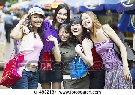 Portrait of a group of young women smiling View Large Photo Image Stock Photo - Portrait of a group of young women smiling. Fotosearch