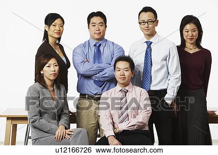 Portrait of three businesswomen and three businessmen smiling View Large Photo Image Stock Photograph - Portrait of three businesswomen and three businessmen smiling. Fotosearch