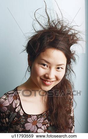 Portrait of a teenage girl smiling View Large Photo Image Stock Photo - Portrait of a teenage girl smiling. Fotosearch