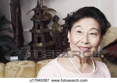 Stock Photo - Close-up of a senior woman smiling. Fotosearch