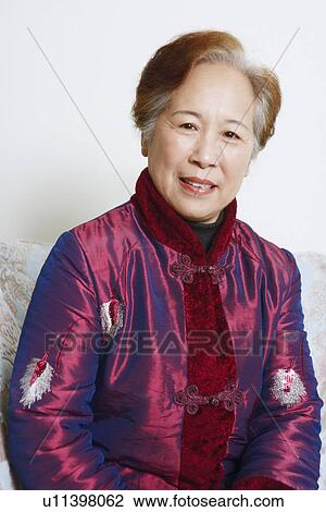 Stock Image - Portrait of a mature woman smiling. Fotosearch