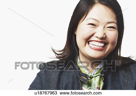 Portrait of a mid adult woman smiling View Large Photo Image Stock Image - Portrait of a mid adult woman smiling. Fotosearch