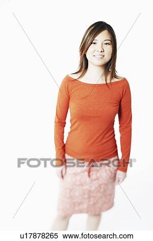 Stock Photography - Portrait of a mid adult woman smiling. Fotosearch