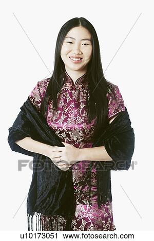 Stock Image - Portrait of a young woman smiling. Fotosearch