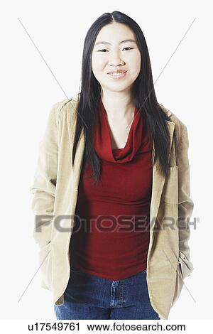 Stock Image - Portrait of a young woman smiling. Fotosearch