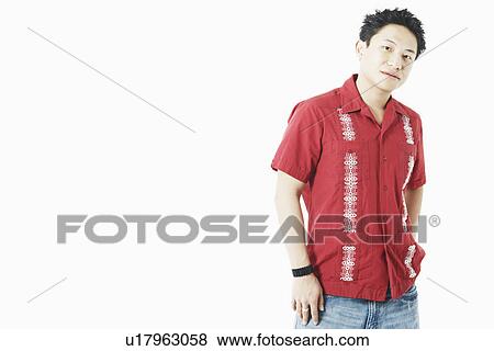 Portrait of a young man standing View Large Photo Image Stock Photo - Portrait of a young man standing. Fotosearch