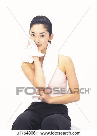 Image of a Young Adult Woman in Sportswear, Wiping the Sweat Off With a Towel, Smiling, Front View, Looking at Camera View Large Photo Image Stock Image - Image of a Young Adult Woman in Sportswear, Wiping the Sweat Off With a Towel, Smiling, Front View, Looking at Camera. Fotosearch
