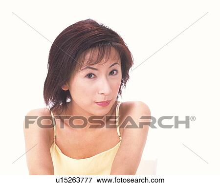 Stock Photo - Japanese woman smiling to camera. Fotosearch