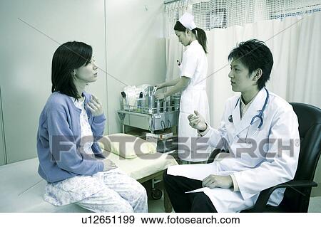 Stock Photo - Doctor and patient. Fotosearch