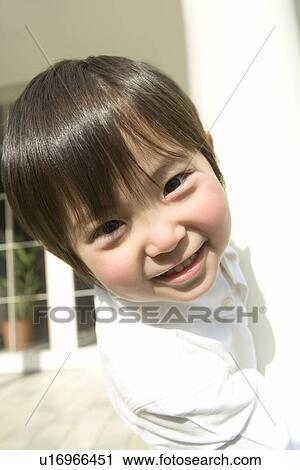 Photography of a boy smiling at camera, Front View View Large Photo Image Stock Image - Photography of a boy smiling at camera, Front View. Fotosearch
