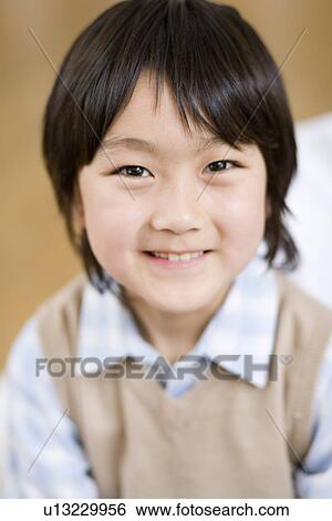 Photography of a boy smiling at camera, Front View View Large Photo Image Stock Photograph - Photography of a boy smiling at camera, Front View. Fotosearch