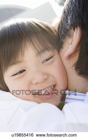 Stock Photograph - Photography of a father and son, Close Up. Fotosearch