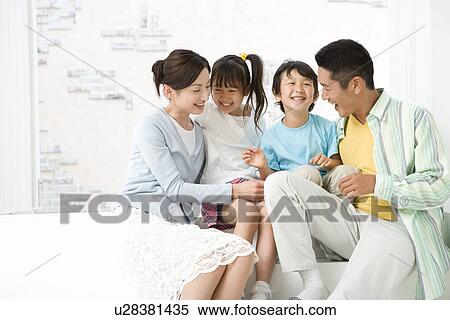 Photography of parents and children smiling, Low Angle View View Large Photo Image Stock Photography - Photography of parents and children smiling, Low Angle View. Fotosearch