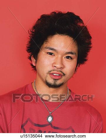 Portrait of Young Man Smiling, Front View View Large Photo Image Picture - Portrait of Young Man Smiling, Front View . Fotosearch