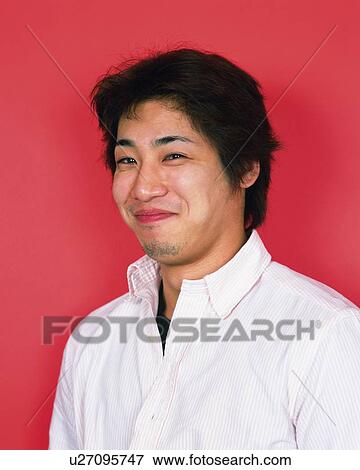 Portrait of Young Man Smiling, Front View View Large Photo Image Stock Photo - Portrait of Young Man Smiling, Front View . Fotosearch