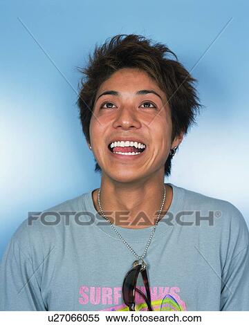 Stock Photography - Portrait of Young Man Smiling, Front View . Fotosearch