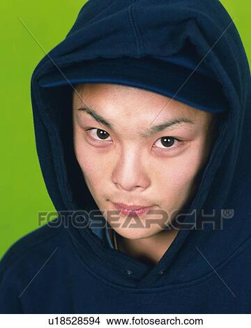 Portrait of Young Man Wearing Hooded Jacket, Front View View Large Photo Image Picture - Portrait of Young Man Wearing Hooded Jacket, Front View . Fotosearch