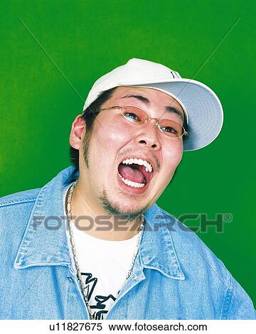 Portrait of Young Man With Mouth Open, Front View  View Large Photo Image Stock Photography - Portrait of Young Man With Mouth Open, Front View . Fotosearch