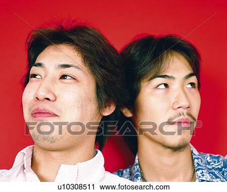 Stock Image - Portrait of Young Men Looking Away, Front View. Fotosearch