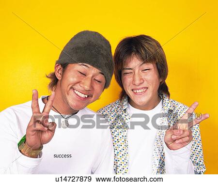 Portrait of Young Men Making Peace Signs, Front View View Large Photo Image Stock Photo - Portrait of Young Men Making Peace Signs, Front View. Fotosearch