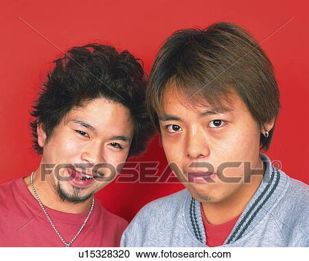 Portrait of Young Men, One Man Sticking Out Tongue, Front View View Large Photo Image Stock Image - Portrait of Young Men, One Man Sticking Out Tongue, Front View. Fotosearch