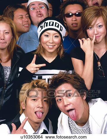 Picture - Portrait of Young People Posing, Making a Face, Front View, Full Frame. Fotosearch