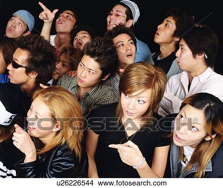 Portrait of Young People Posing, Looking Away, High Angle View, Full Frame View Large Photo Image Picture - Portrait of Young People Posing, Looking Away, High Angle View, Full Frame. Fotosearch