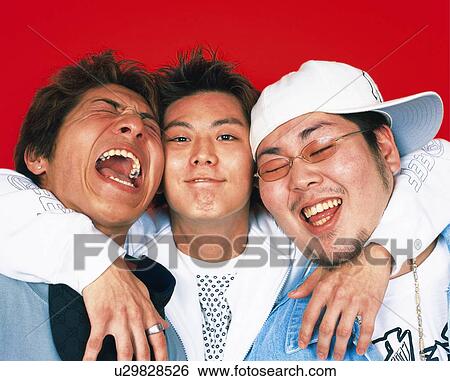 Young Man With Arms Around Two Young Men, Portrait, Smiling View Large Photo Image Stock Photograph - Young Man With Arms Around Two Young Men, Portrait, Smiling . Fotosearch